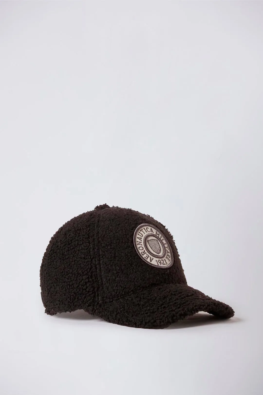 Teddy fabric cap with embroidered insert